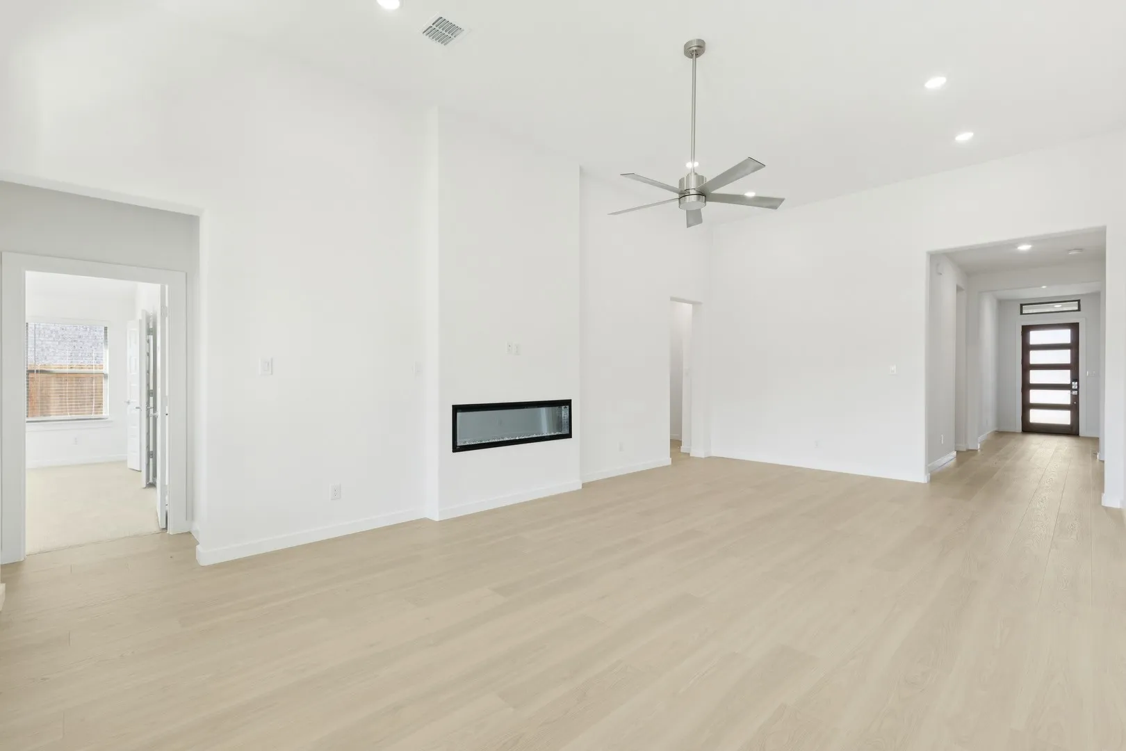 Living Room in the Gilmour II home plan by Trophy Signature Homes – REPRESENTATIVE PHOTO