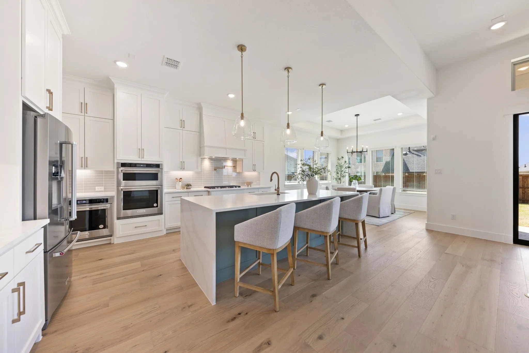 The spacious kitchen island is the hub of your new dream kitchen!