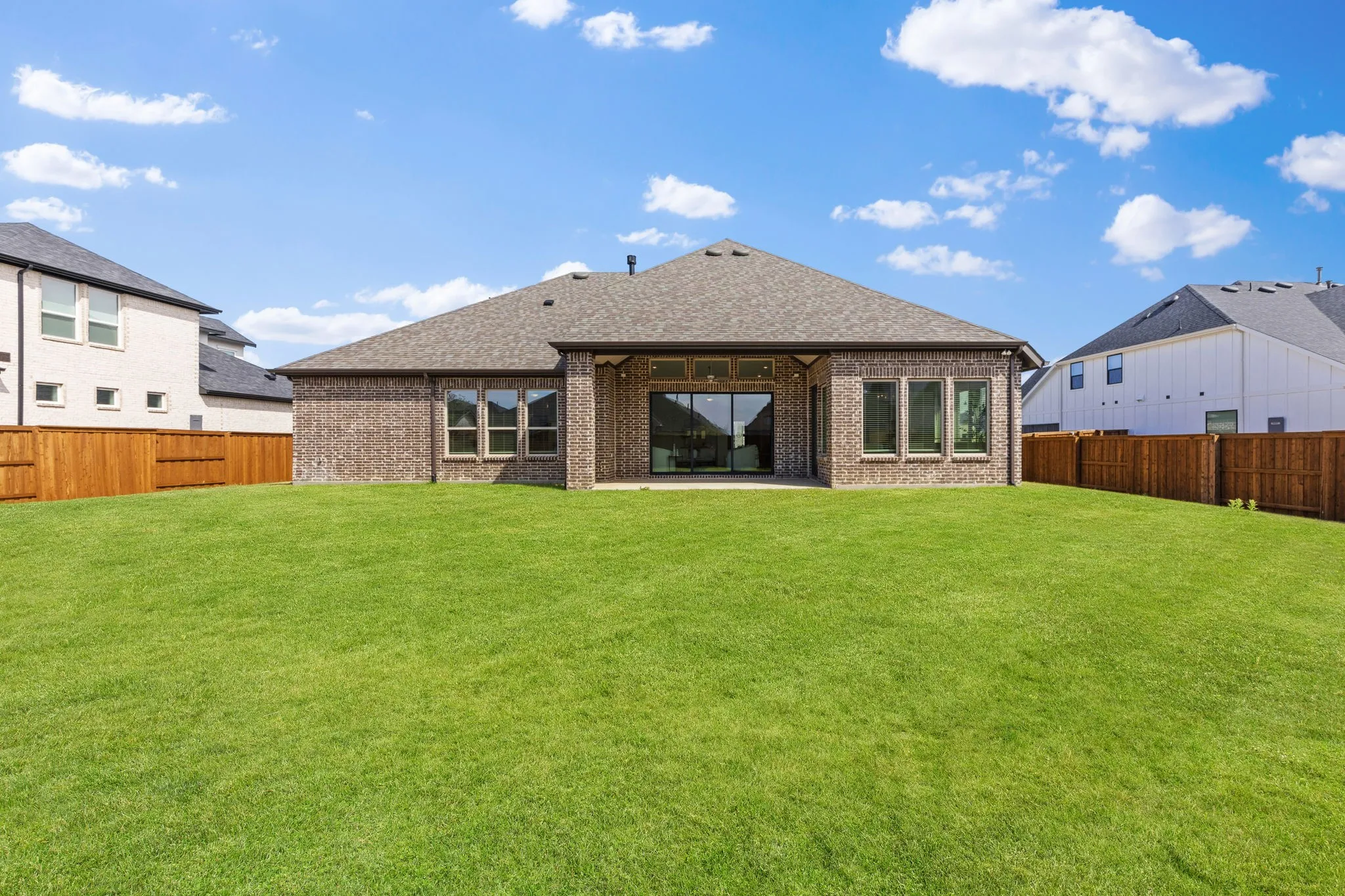 Whether it's dining al fresco on your covered patio or hosting a fun family bbq, the summer fun never stops in this private, fenced back yard!