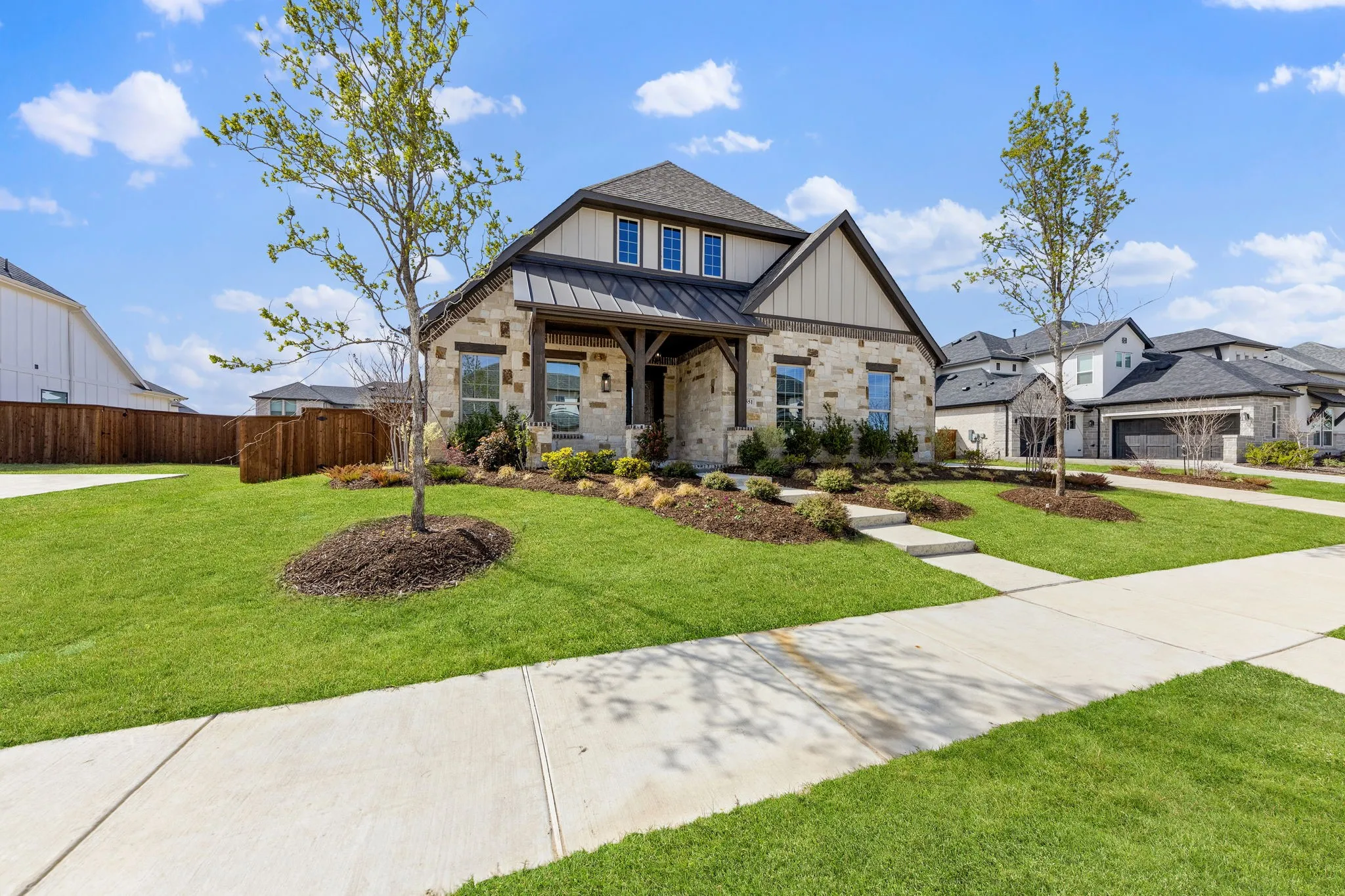 Featuring a beautiful combination of finishes and delightful landscaping, our Ariya plan offers simply charming curb appeal!