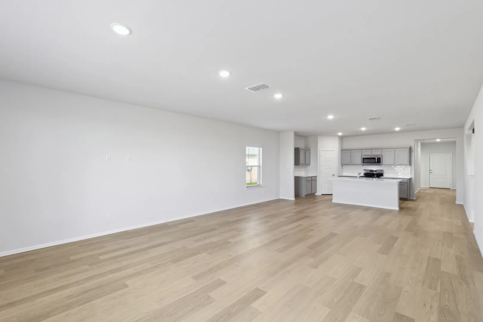 Open First Floor in the Holden home plan by Trophy Signature Homes – REPRESENTATIVE PHOTO