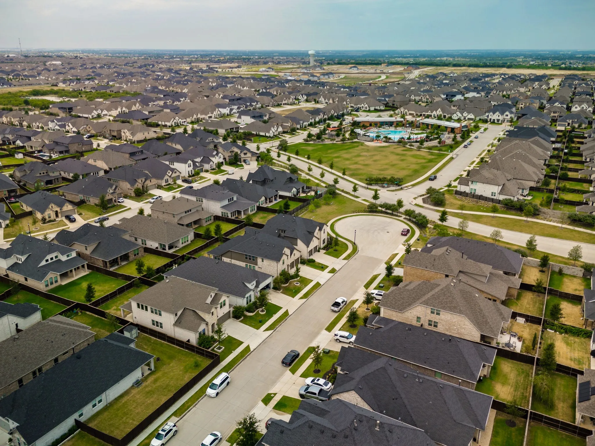 View of property location with nearby suburban area