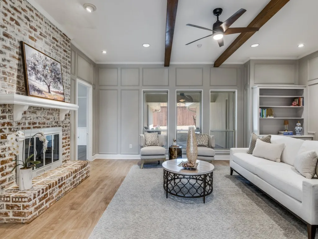 Gorgeous new whitewashed fireplace creates a lovely centerpiece.