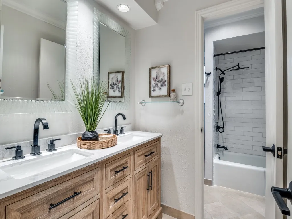 Bathroom with on-trend updates and dual sinks.