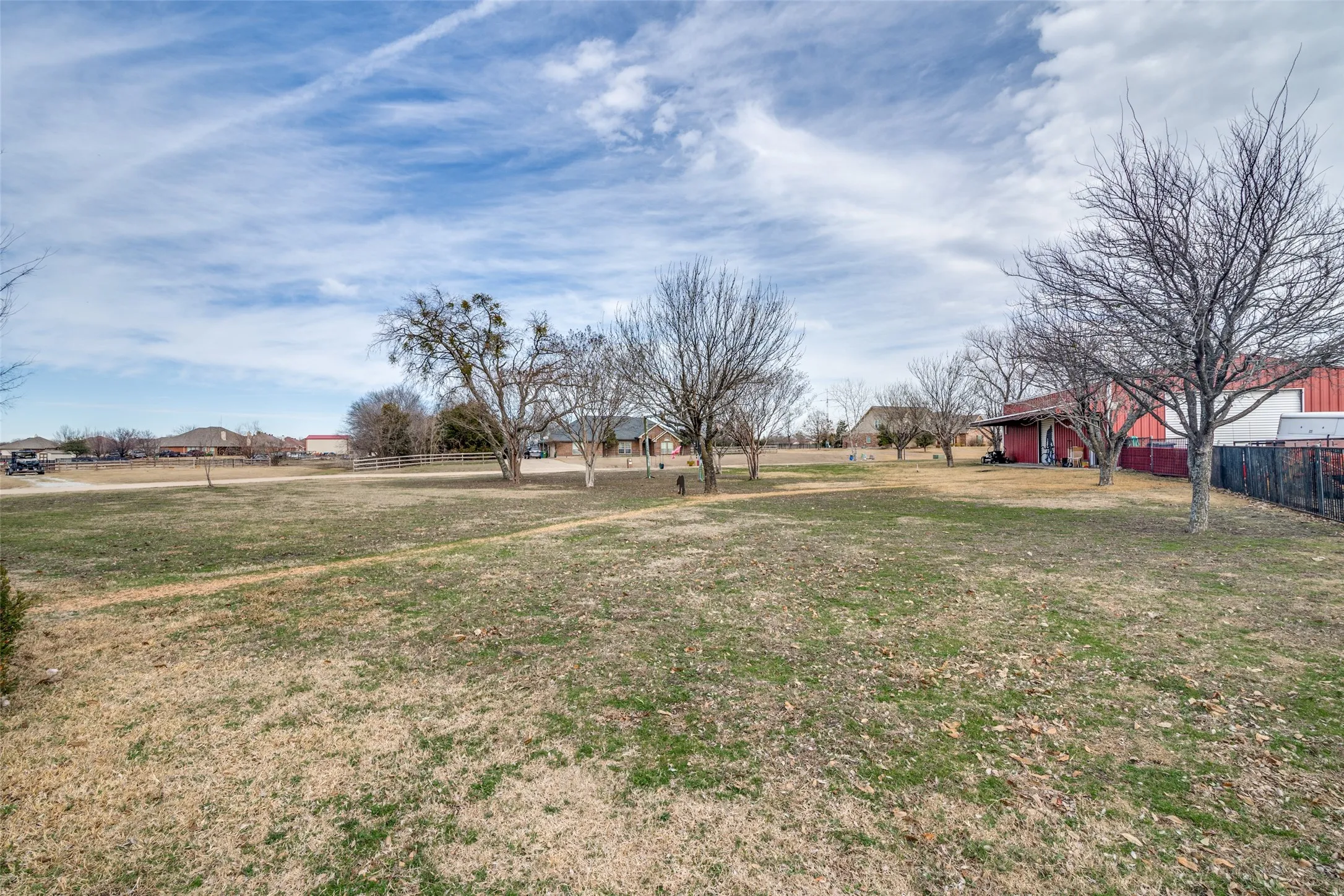 View of yard with a residential view and workshop