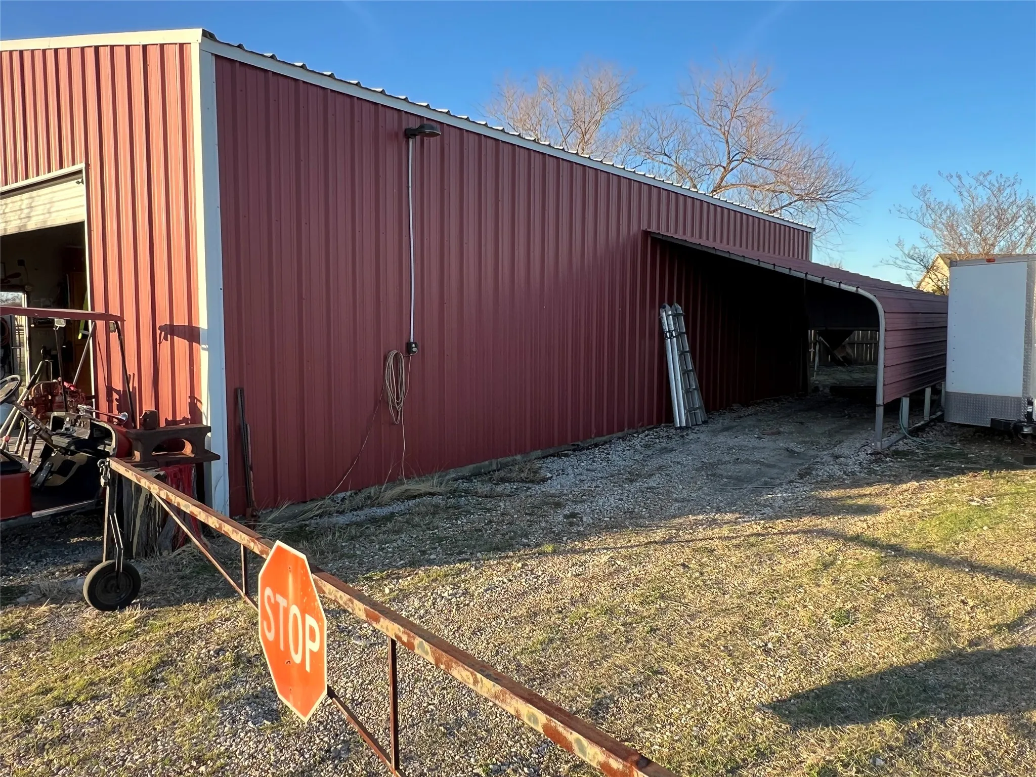 View of pole building featuring a carport