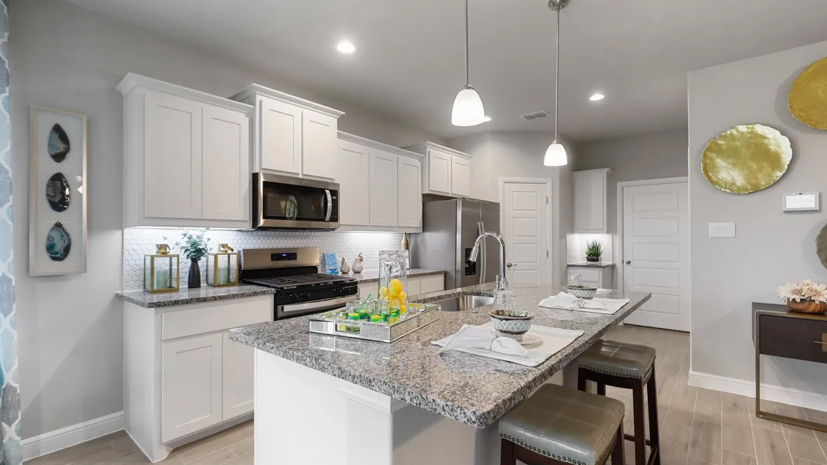 Kitchen-All Home and community information, including pricing, included features, terms, availability and amenities, are subject to change at any time without notice or obligation. All Drawings, pictures, photographs, video, square footages, floor plans, elevations, features, colors and sizes are approximate for illustration purposes only and will vary from the homes as built.