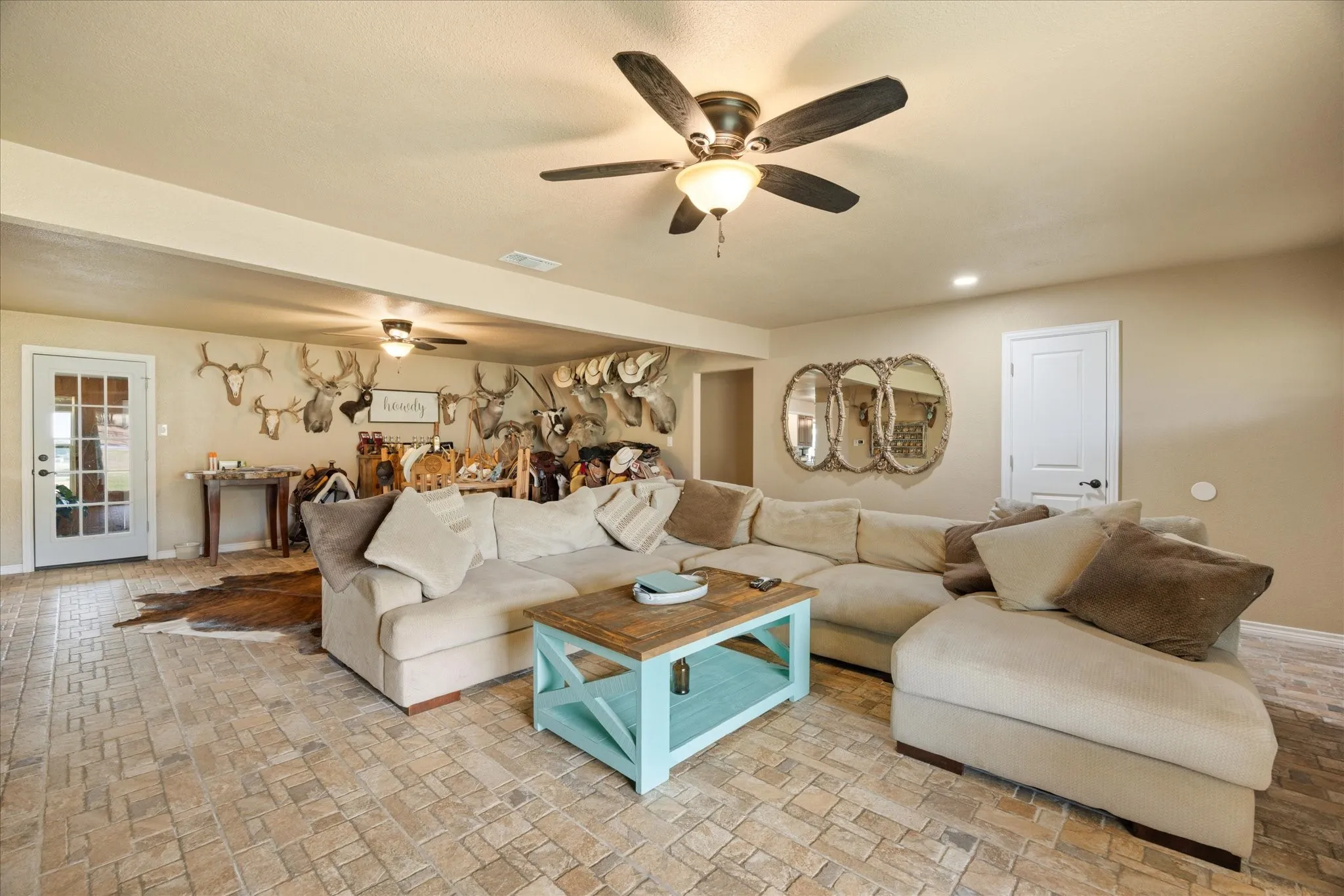 Living room featuring ceiling fan