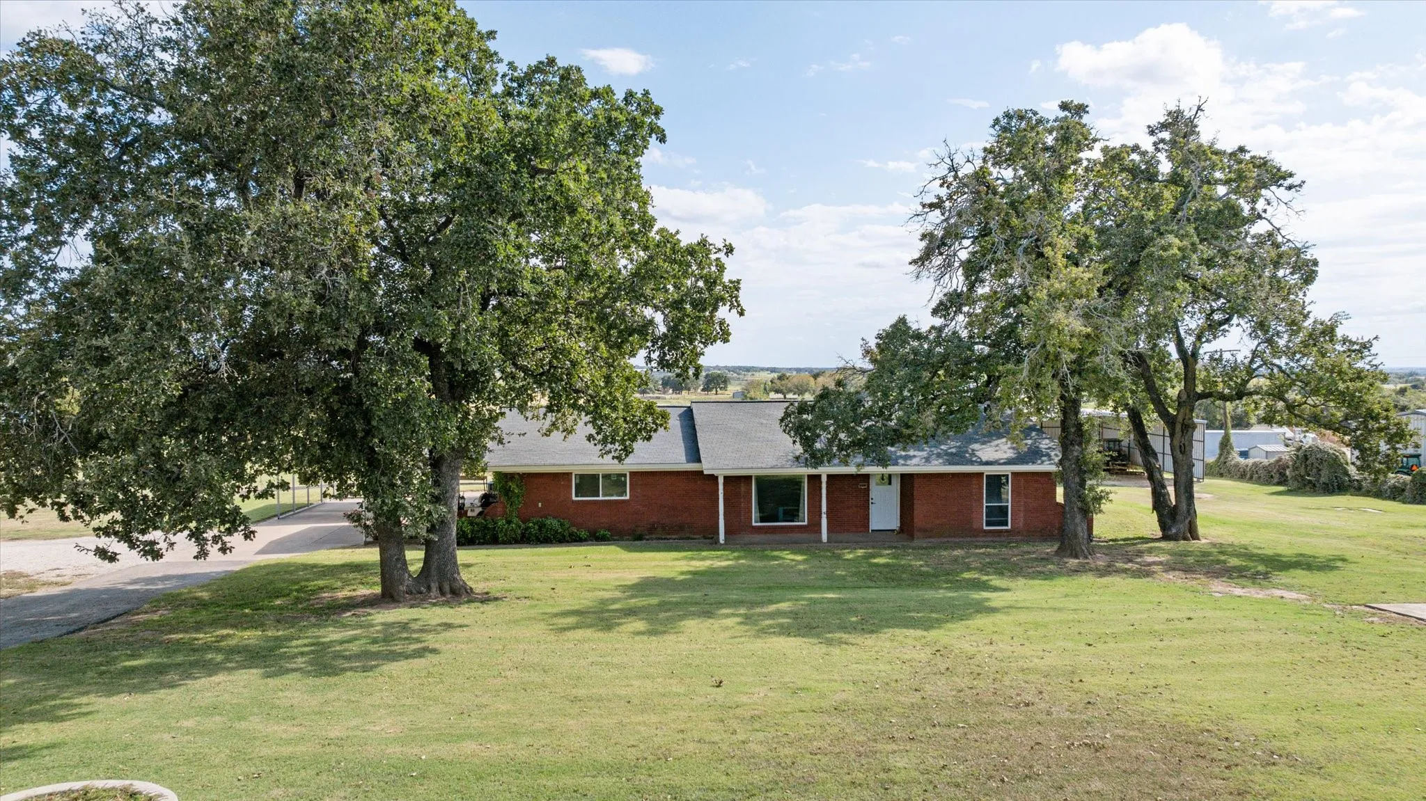 Ranch-style house with a front lawn