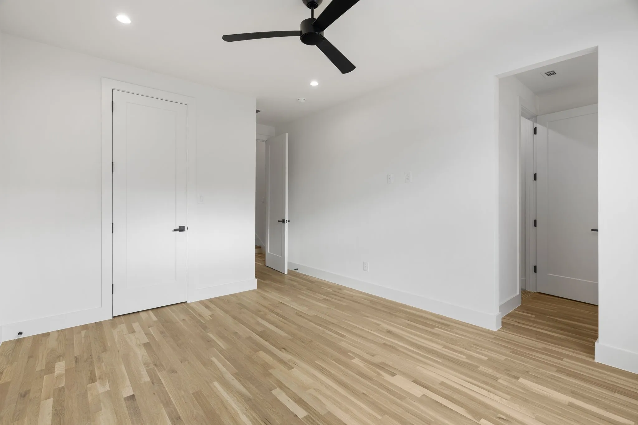 Unfurnished bedroom featuring recessed lighting, light wood finished floors, and ceiling fan