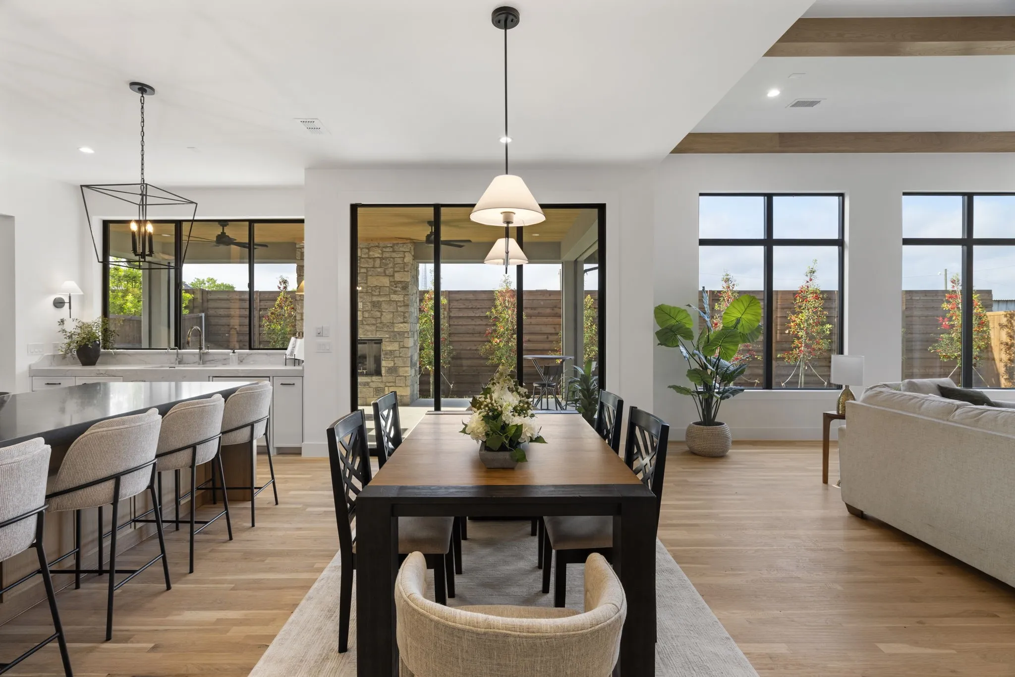 Dining space with light wood-style flooring and recessed lighting