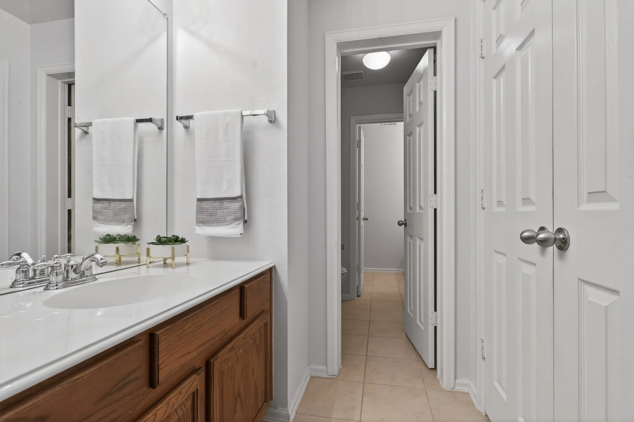 Upstairs, 2 well-designed J&J baths provide both privacy & convenience, an increasingly sought-after feature.