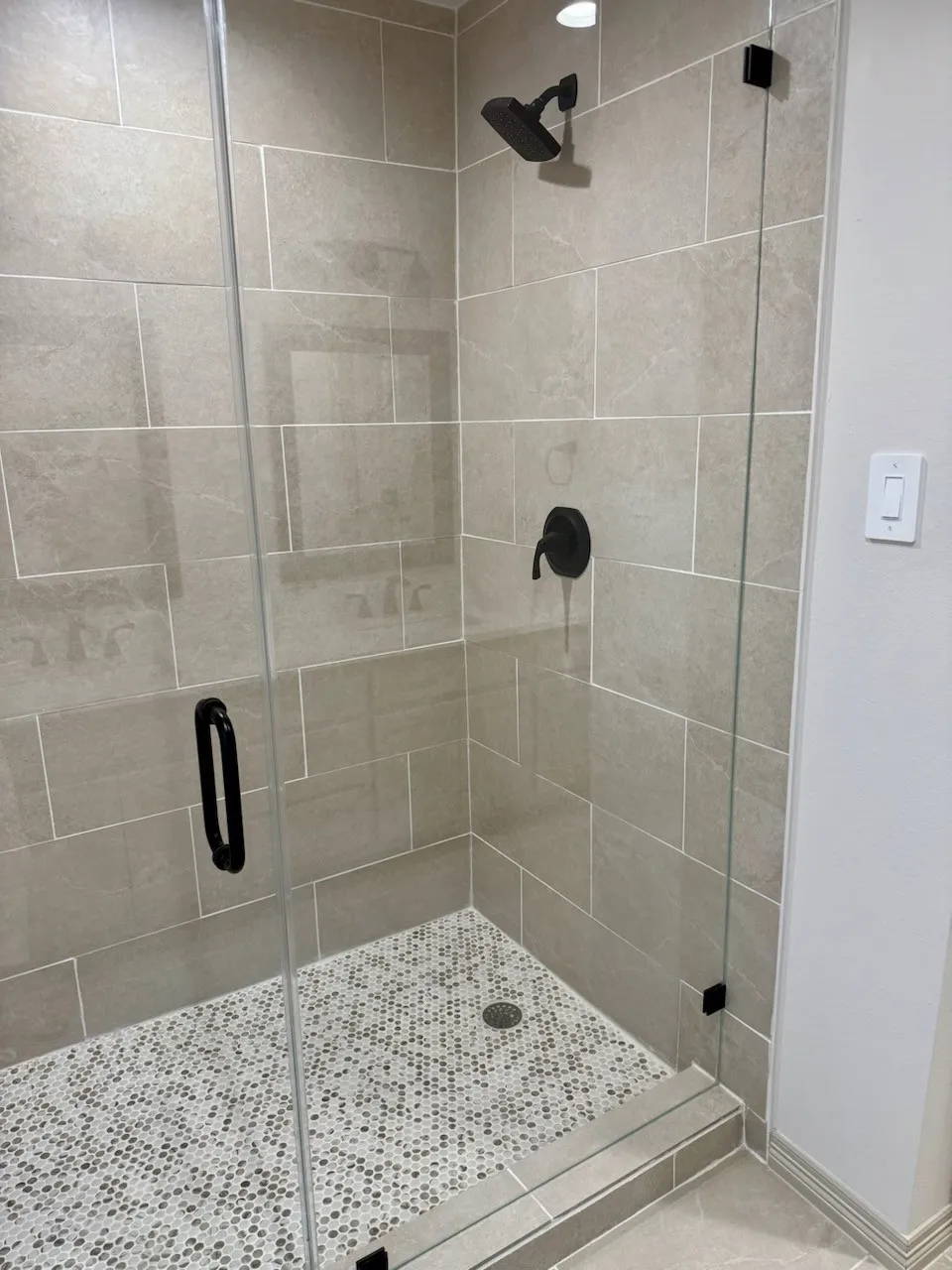 Bathroom featuring a walk-in shower stall