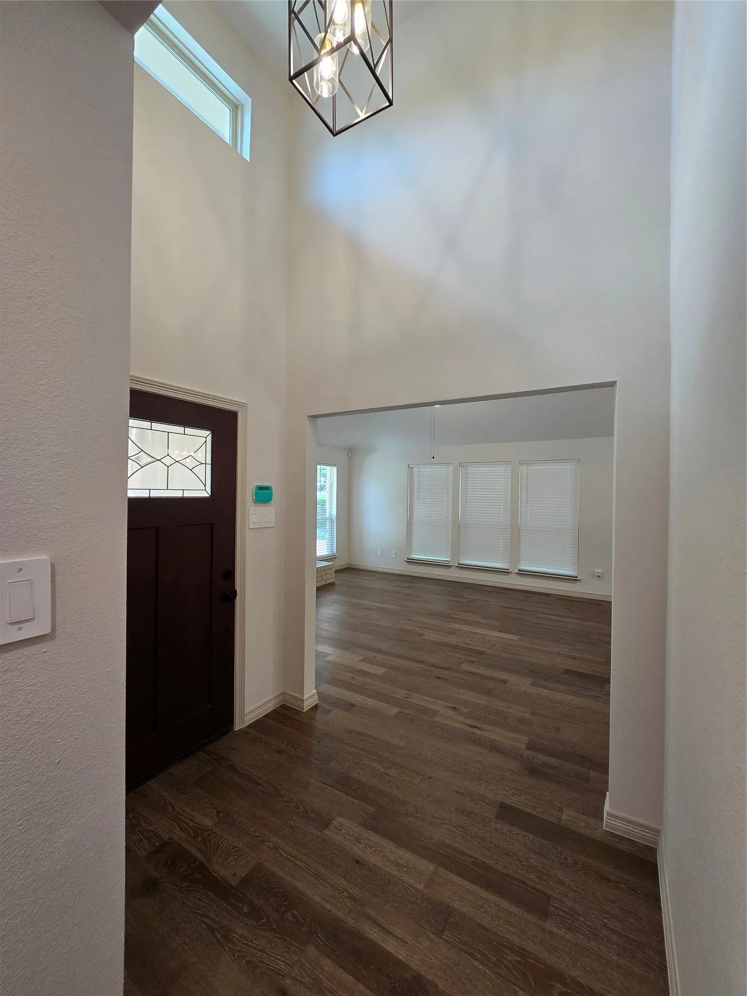 Entryway featuring raised ceiling