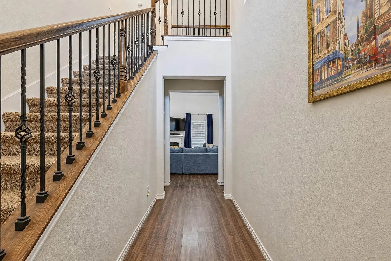 Two story entrance with stairs to second floor *digitally altered to show potential*