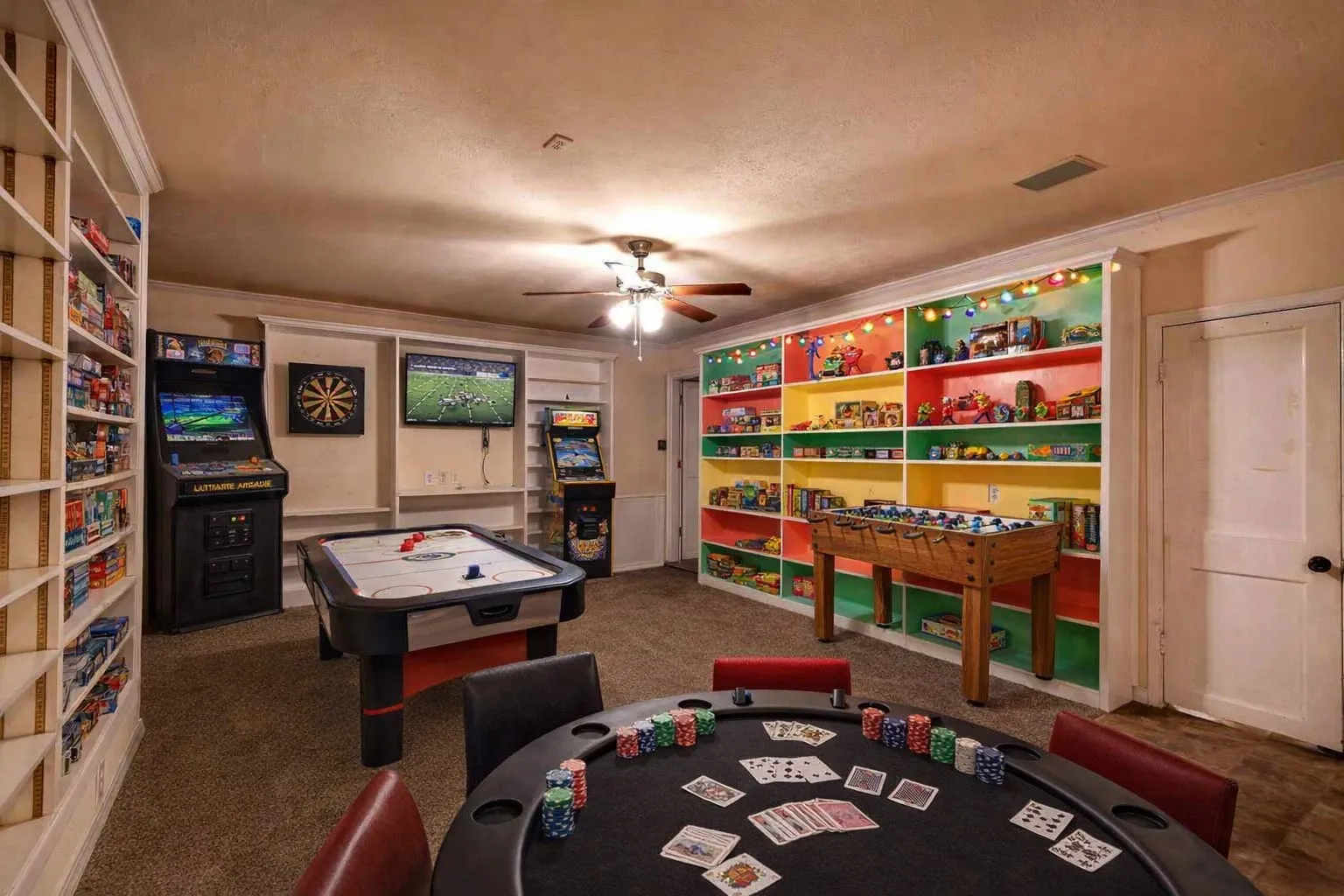 Virtually staged - Game room with built ins, desk & window seat storage