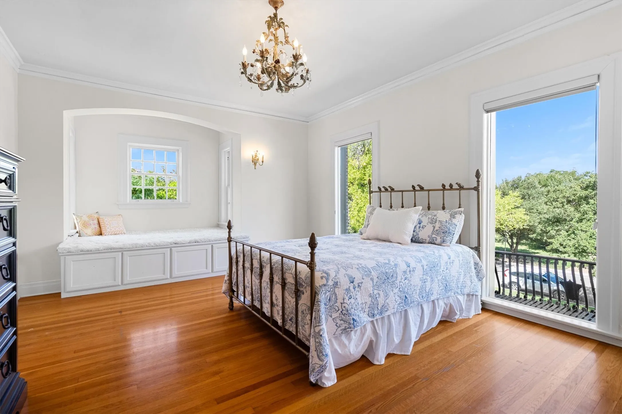 A bright window seat anchors this bedroom,
complemented by a private en suite bath for both convenience and relaxation.