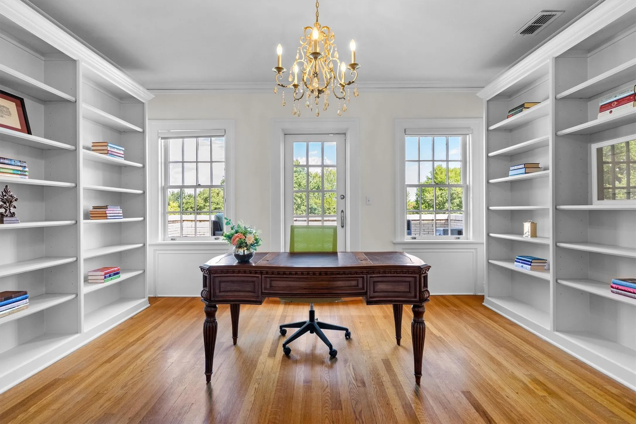 This elegant library exudes warmth and
sophistication, featuring built-in shelves that showcase your favorite books and treasures making this the perfect space for reading, reflection, or quiet conversation.