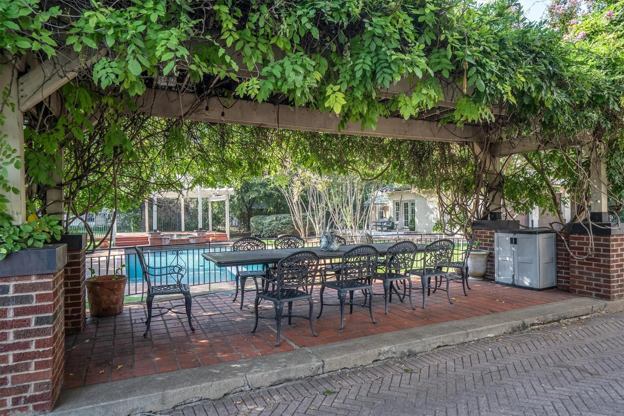 This charming pavilion provides the perfect setting for entertaining, offering a covered, open-air space ideal for gatherings, dining, and enjoying the outdoors in comfort and style.