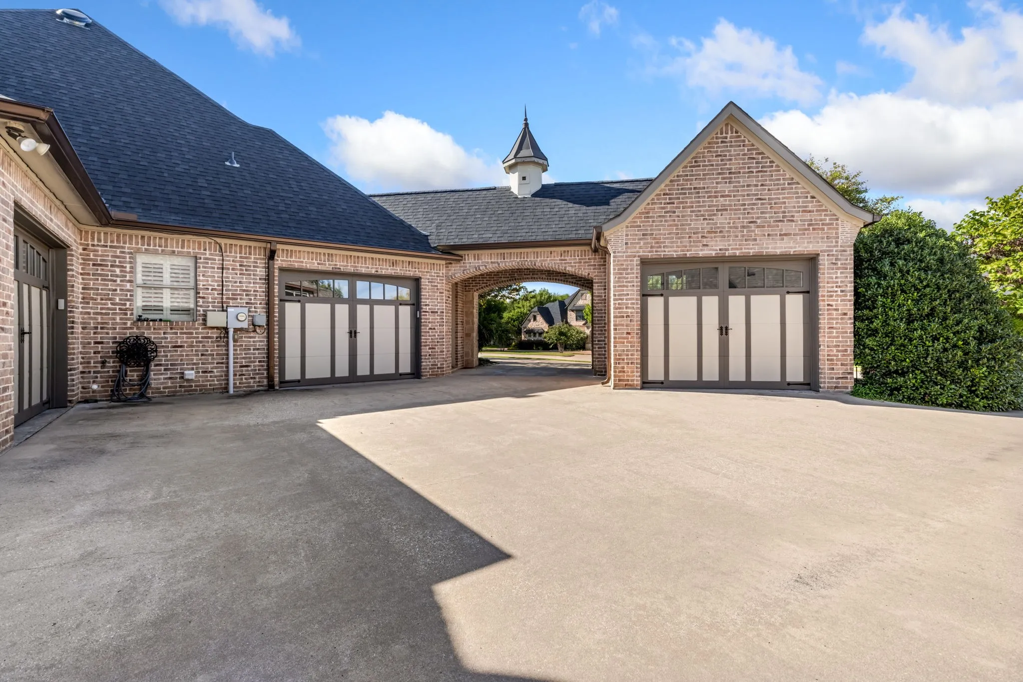 Garage featuring driveway