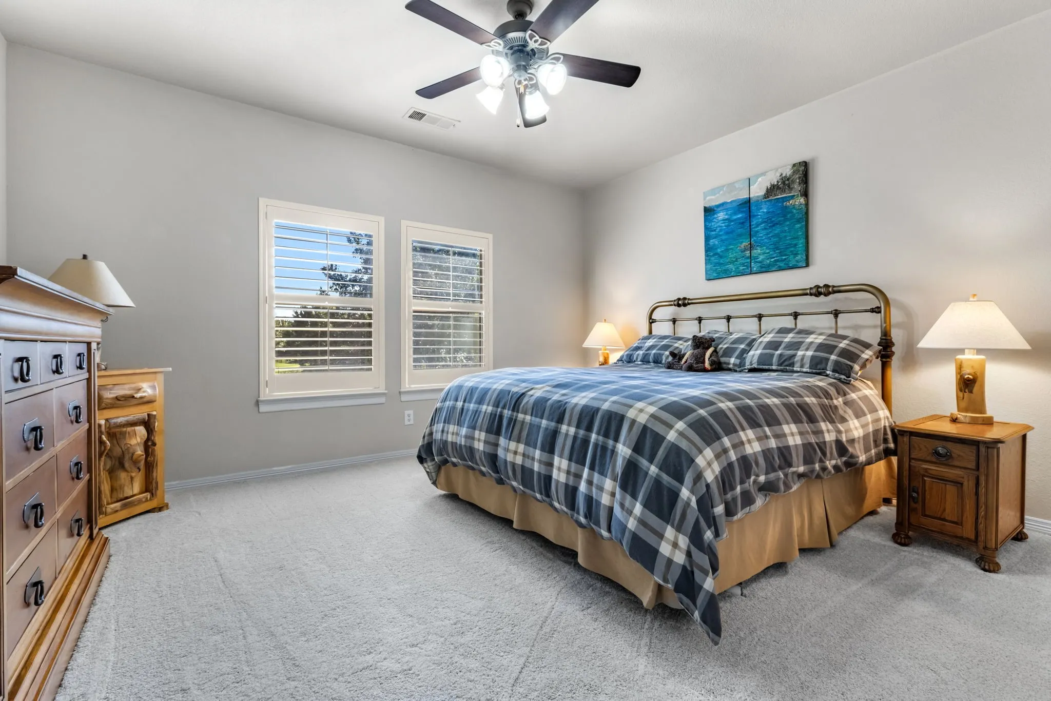 Bedroom featuring carpet flooring and ceiling fan