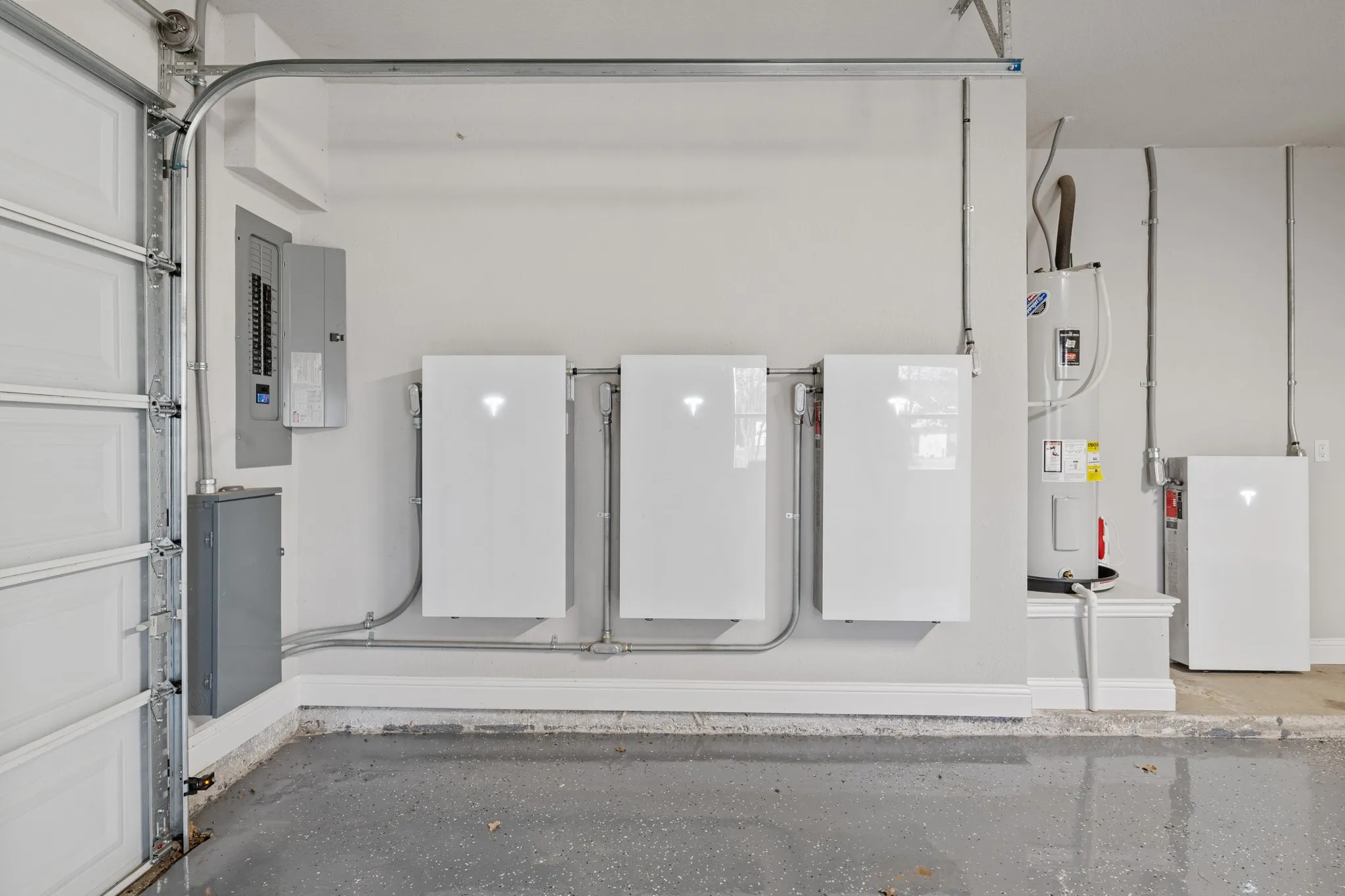 Home has a Tesla battery back up system with solar panels. In the case of a power grid failure the system can run the home.