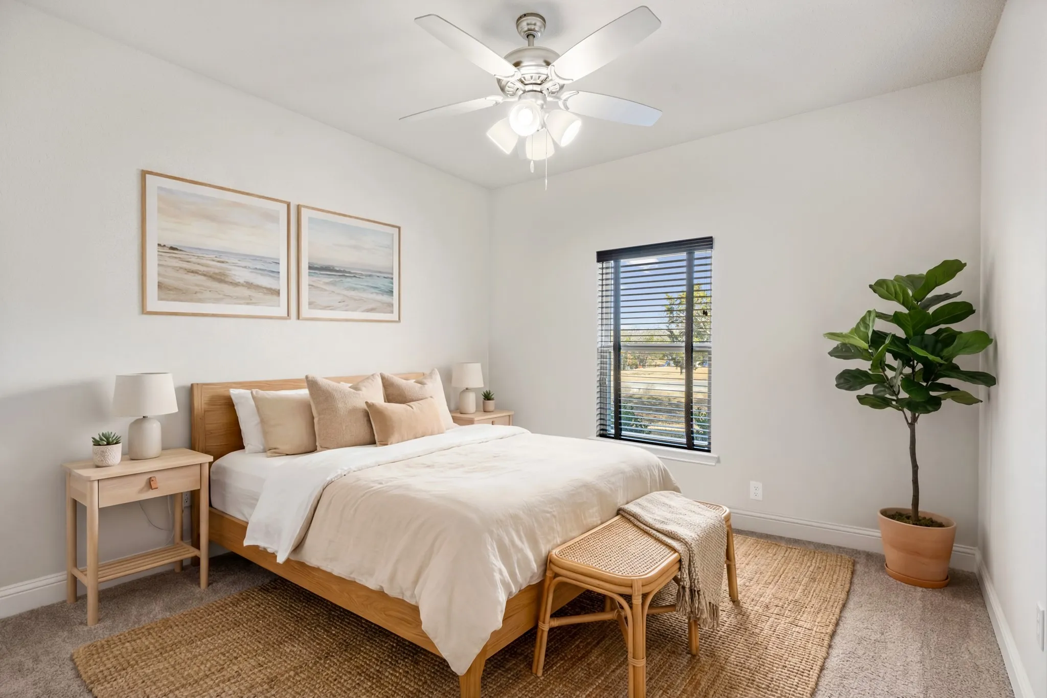 Secondary bedroom features a fan.