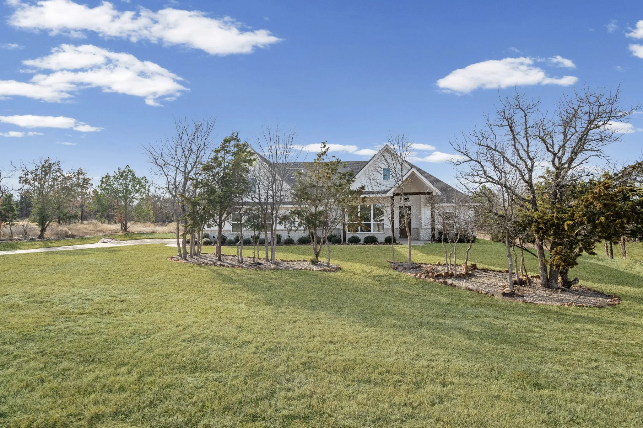 As these trees grow, they create more privacy for the home.