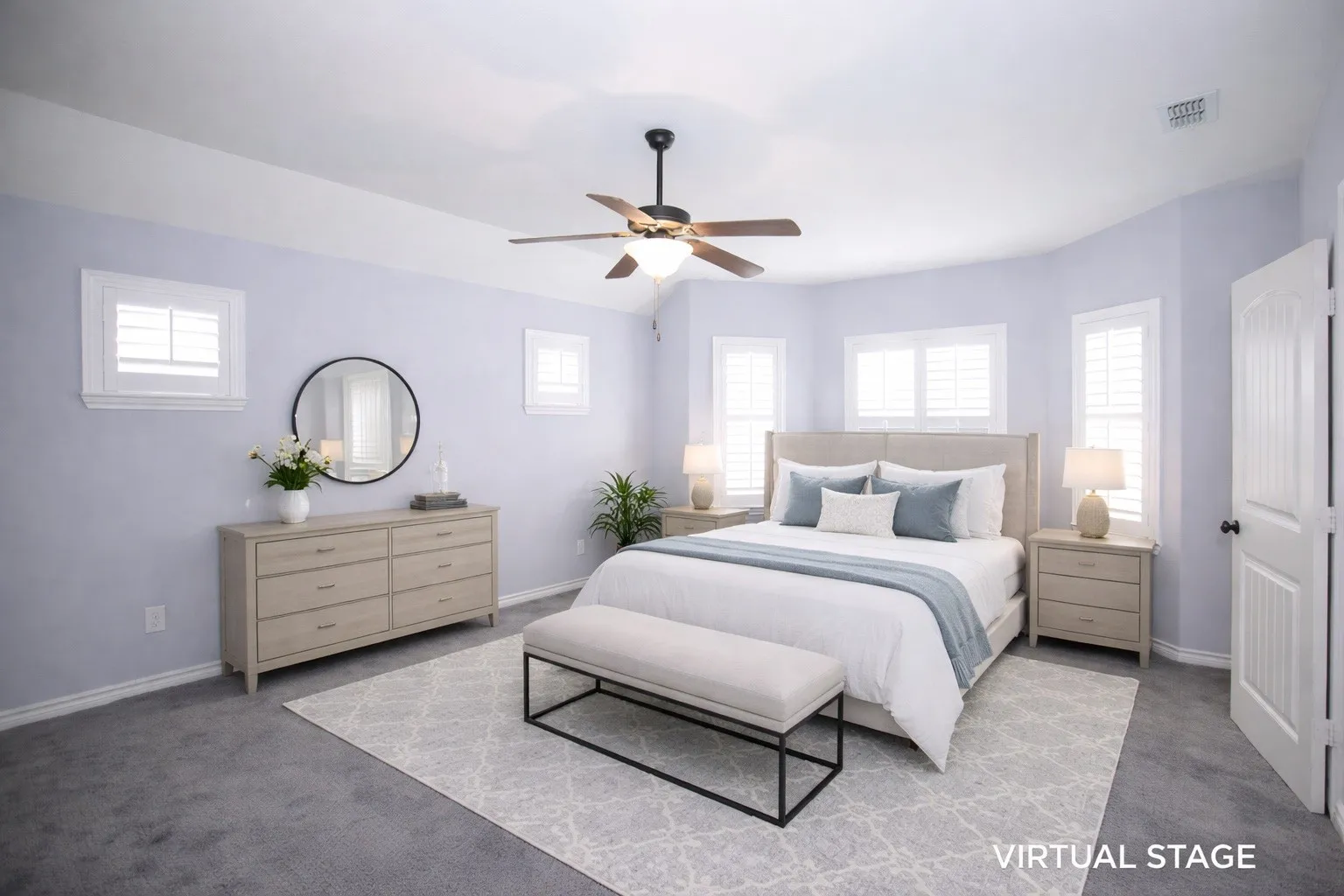Virtual Staged Carpeted bedroom with baseboards and ceiling fan