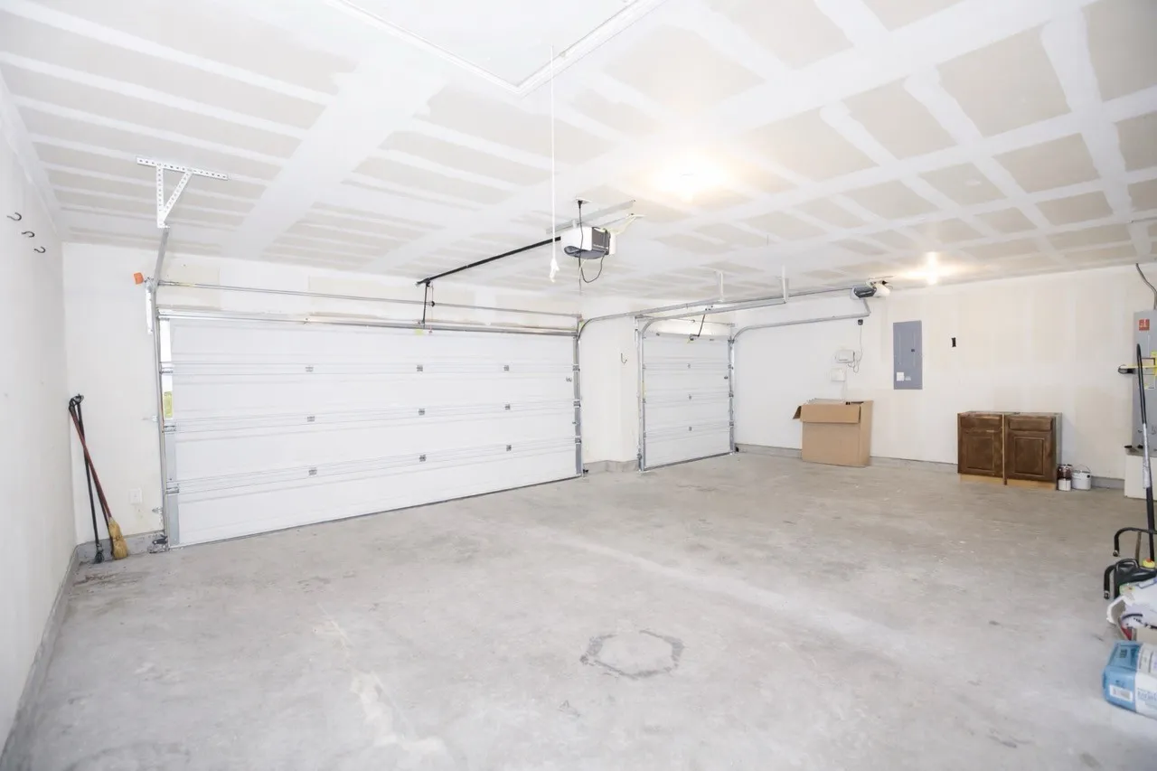 Garage featuring electric panel