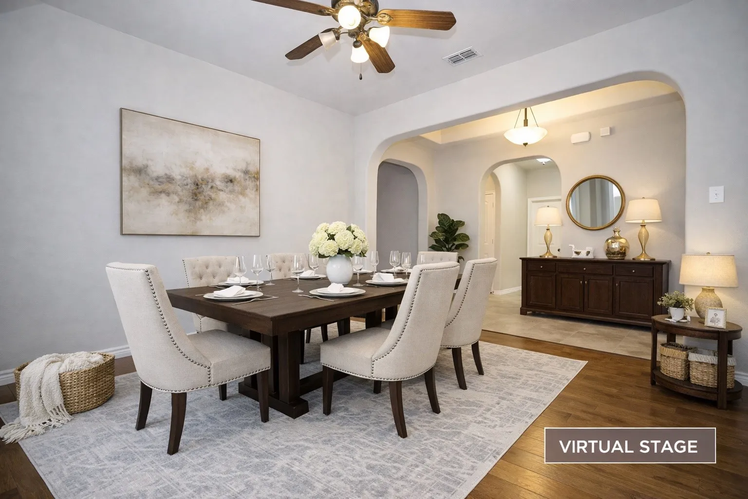 Virtual Staged Dining room with light wood-style floors and ceiling fan