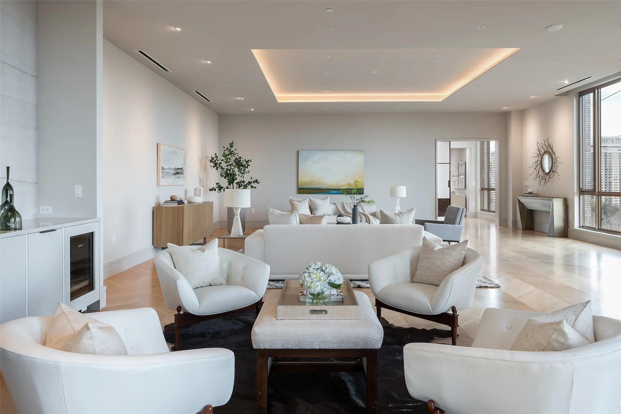 Common area with a raised ceiling