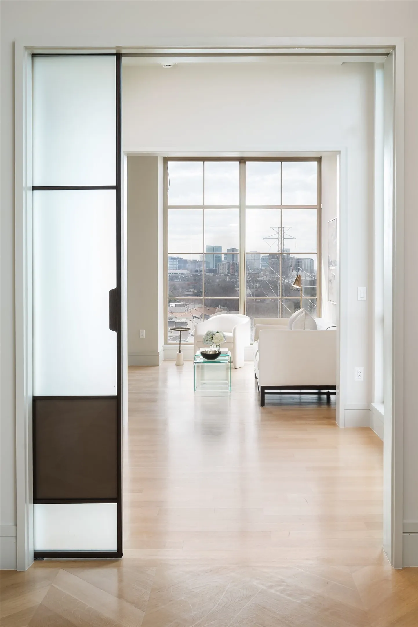 Master Bedroom Vestibule with custom privacy pocket doors