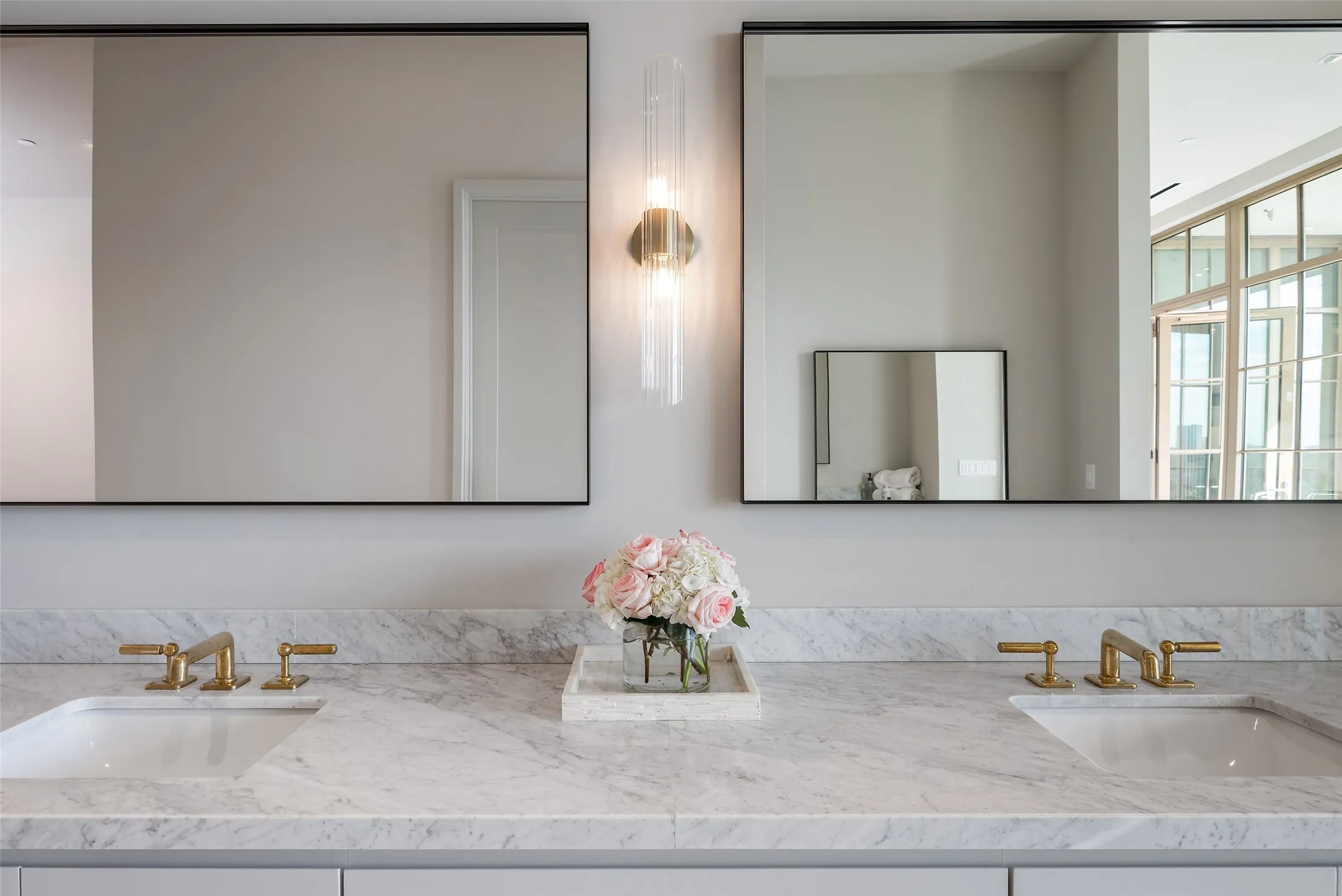 Full bath featuring double vanity
