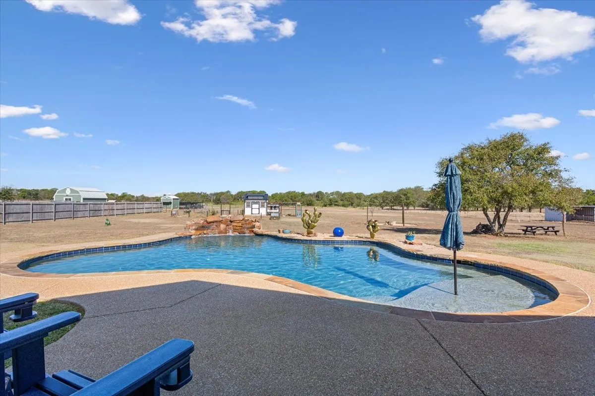 Swimming pool featuring a patio