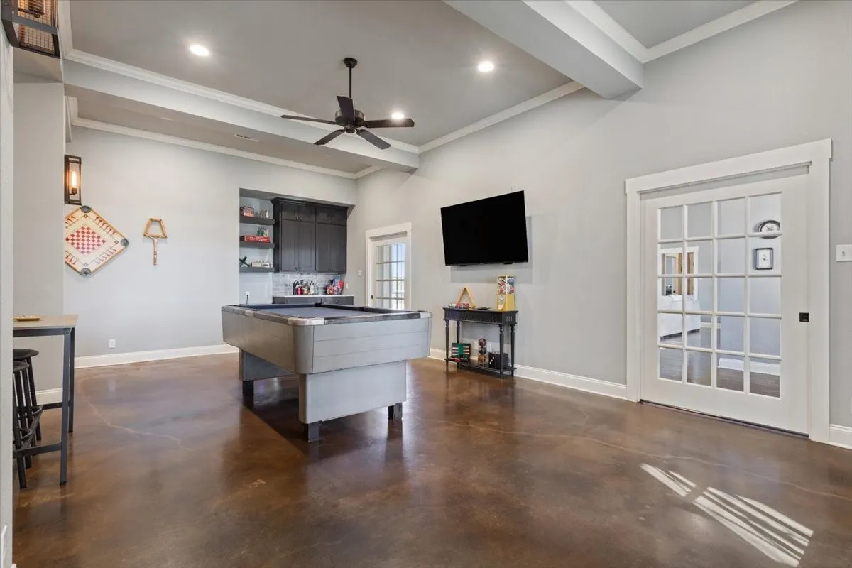 Recreation room featuring concrete floors, a ceiling fan, billiards, and recessed lighting