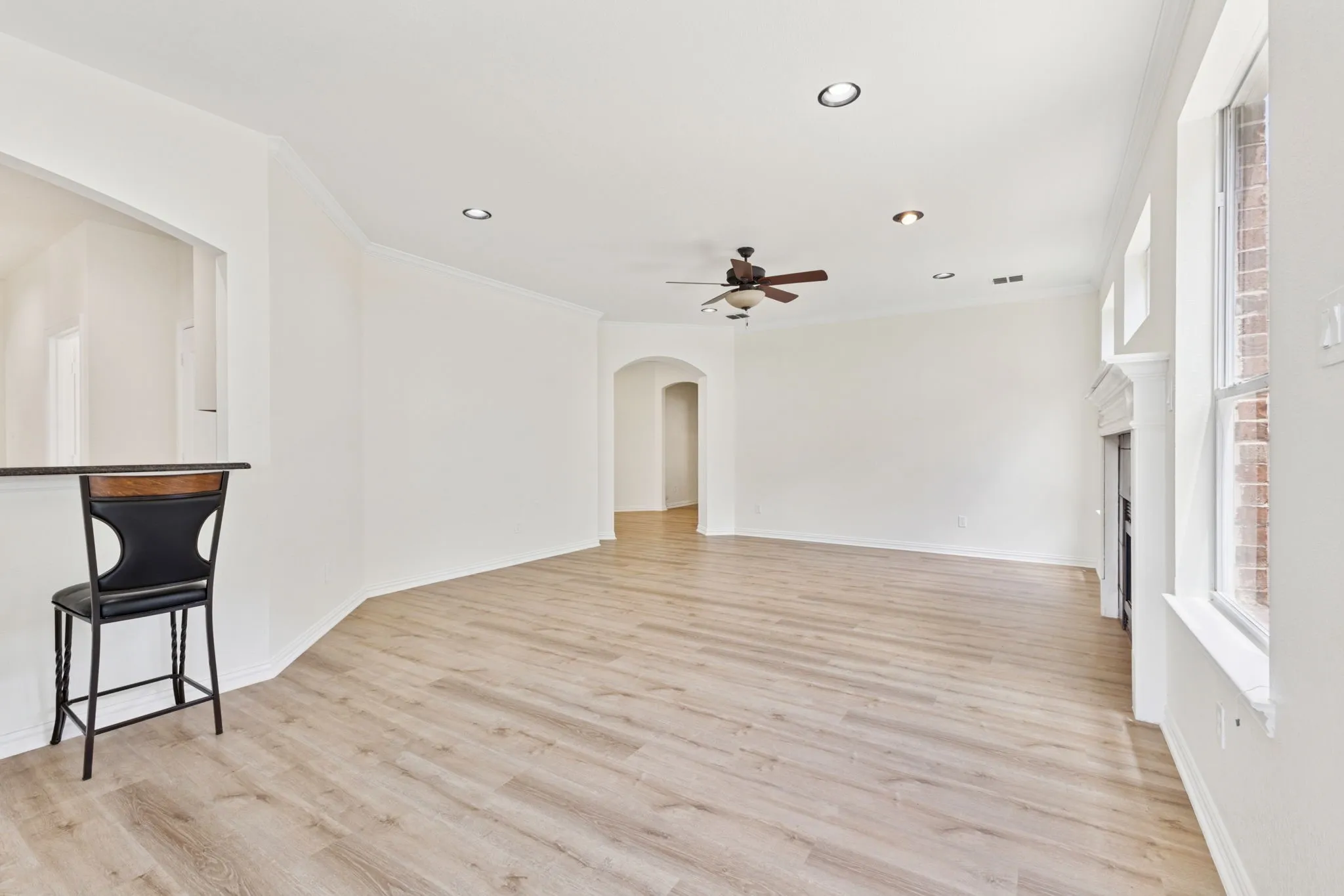 View of the living room from smaller dining room space.