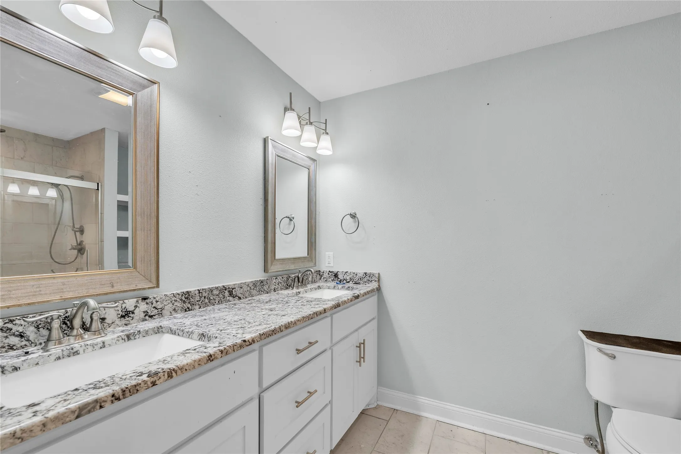 Master bath - Full bathroom featuring double vanity and a stall shower