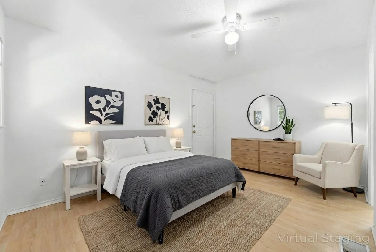 Bedroom featuring light wood-style floors and ceiling fan