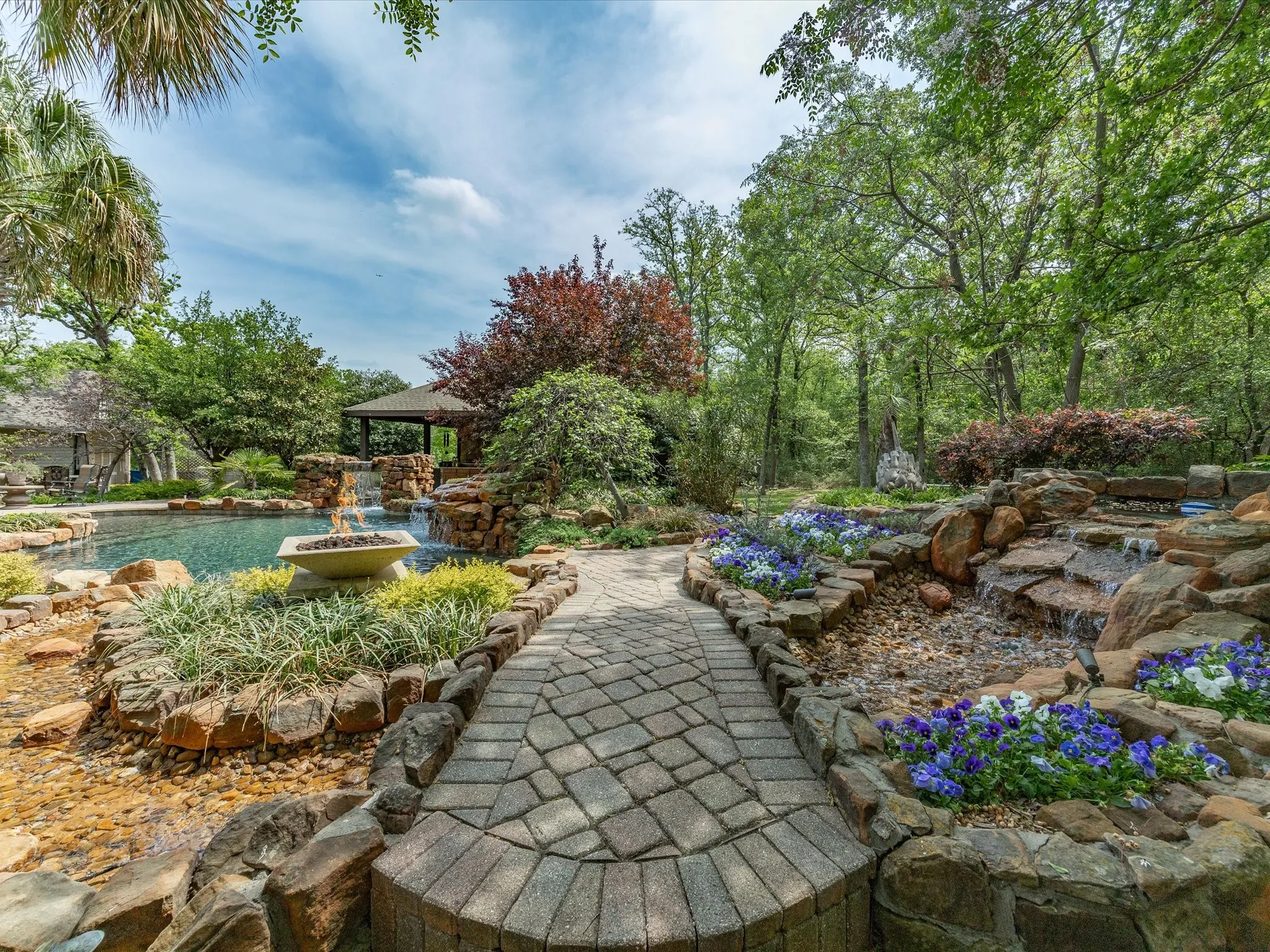 Bridge over water feature. Spa is up and to the right
