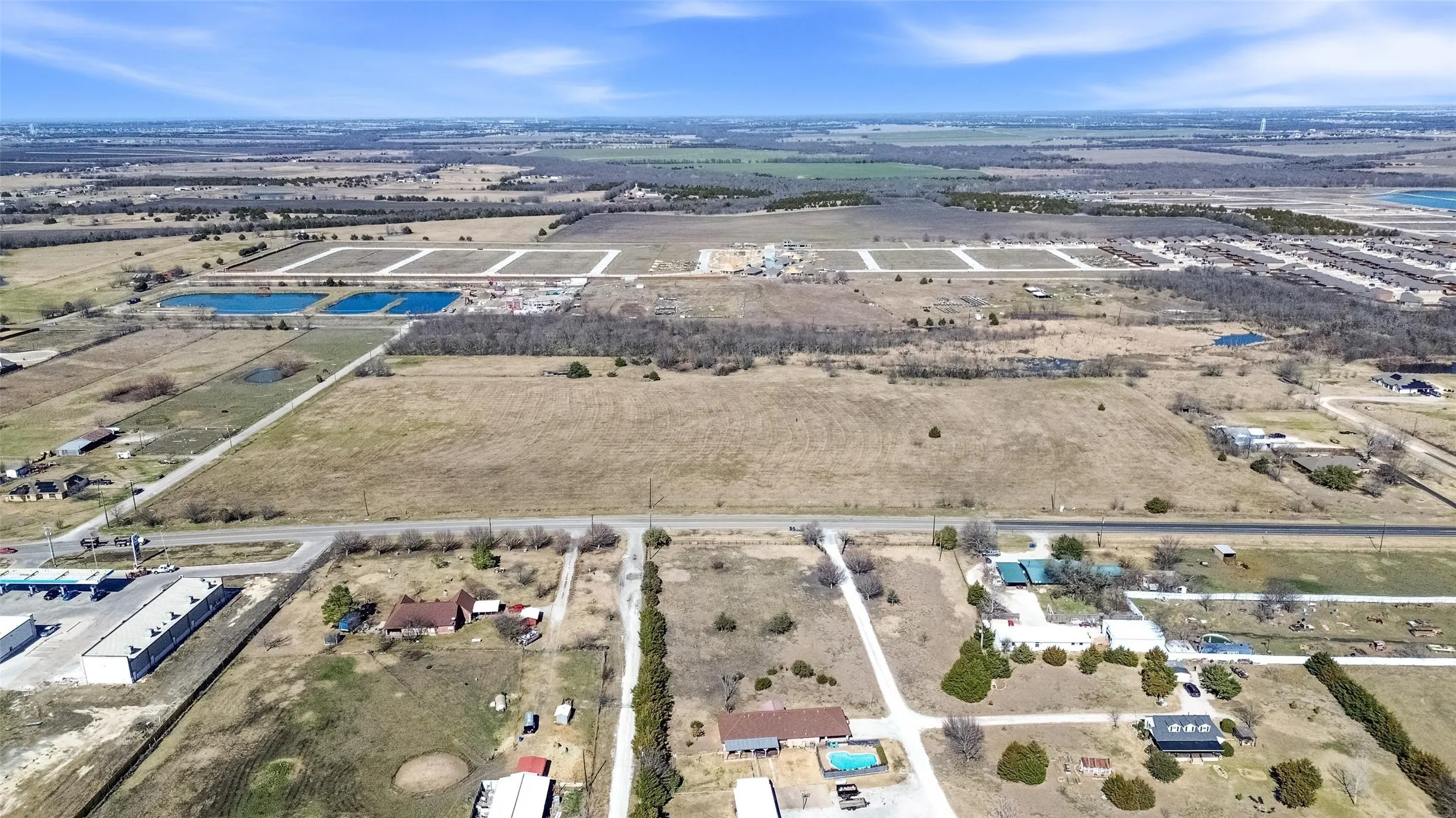 Aerial view of property's location featuring rural landscape