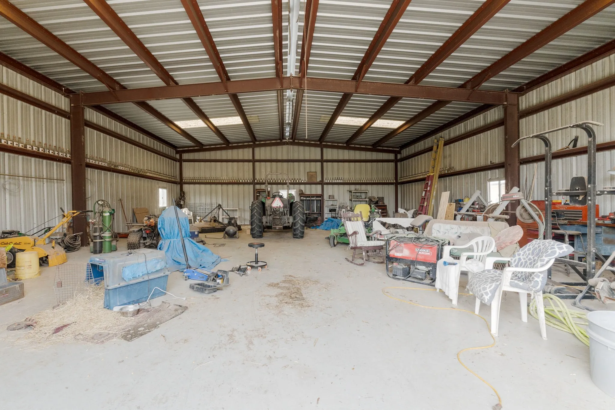Garage with metal​​‌​​​​‌​​‌‌​‌‌​​​‌‌​‌​‌​‌​​​‌​​ wall