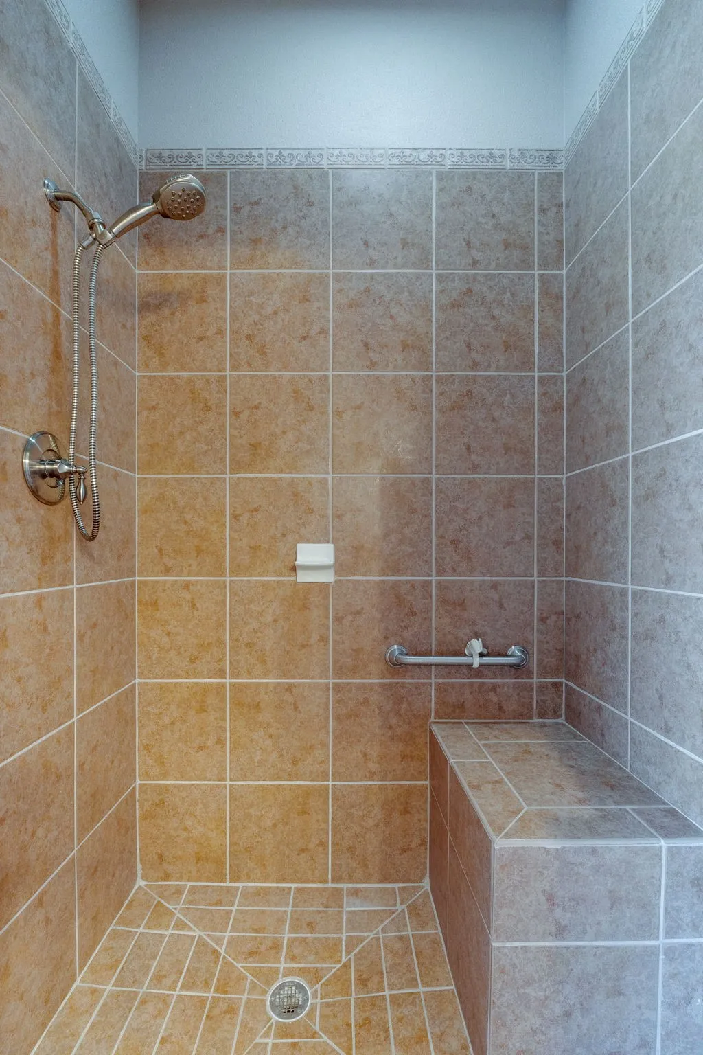 Bathroom featuring a shower stall