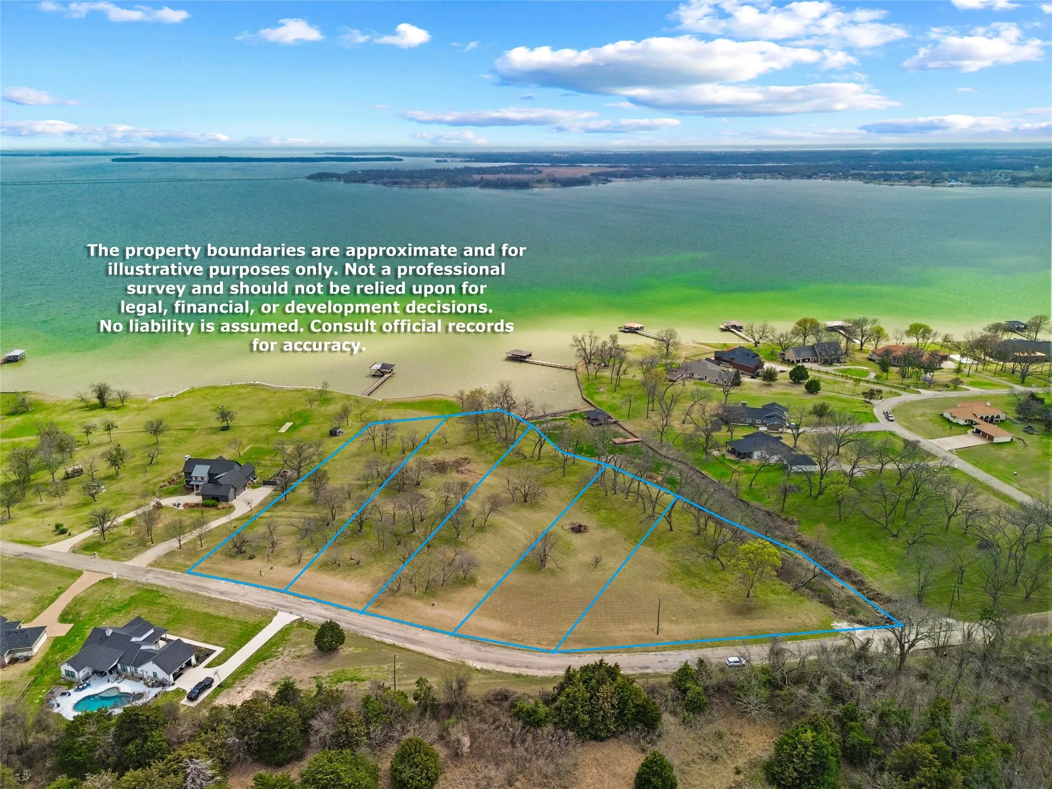 View of property location featuring property boundaries highlighted and a large body of water