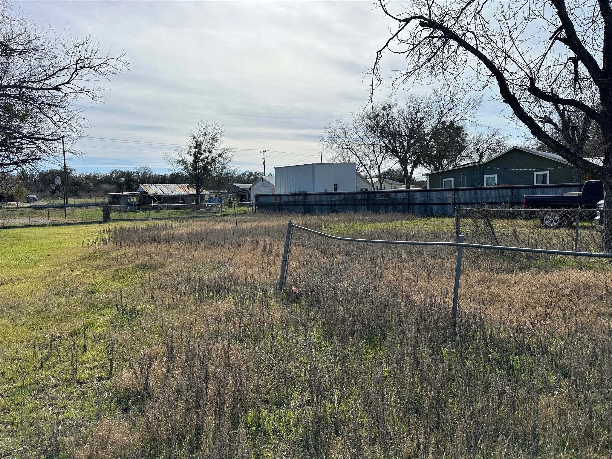 View of yard with a rural view