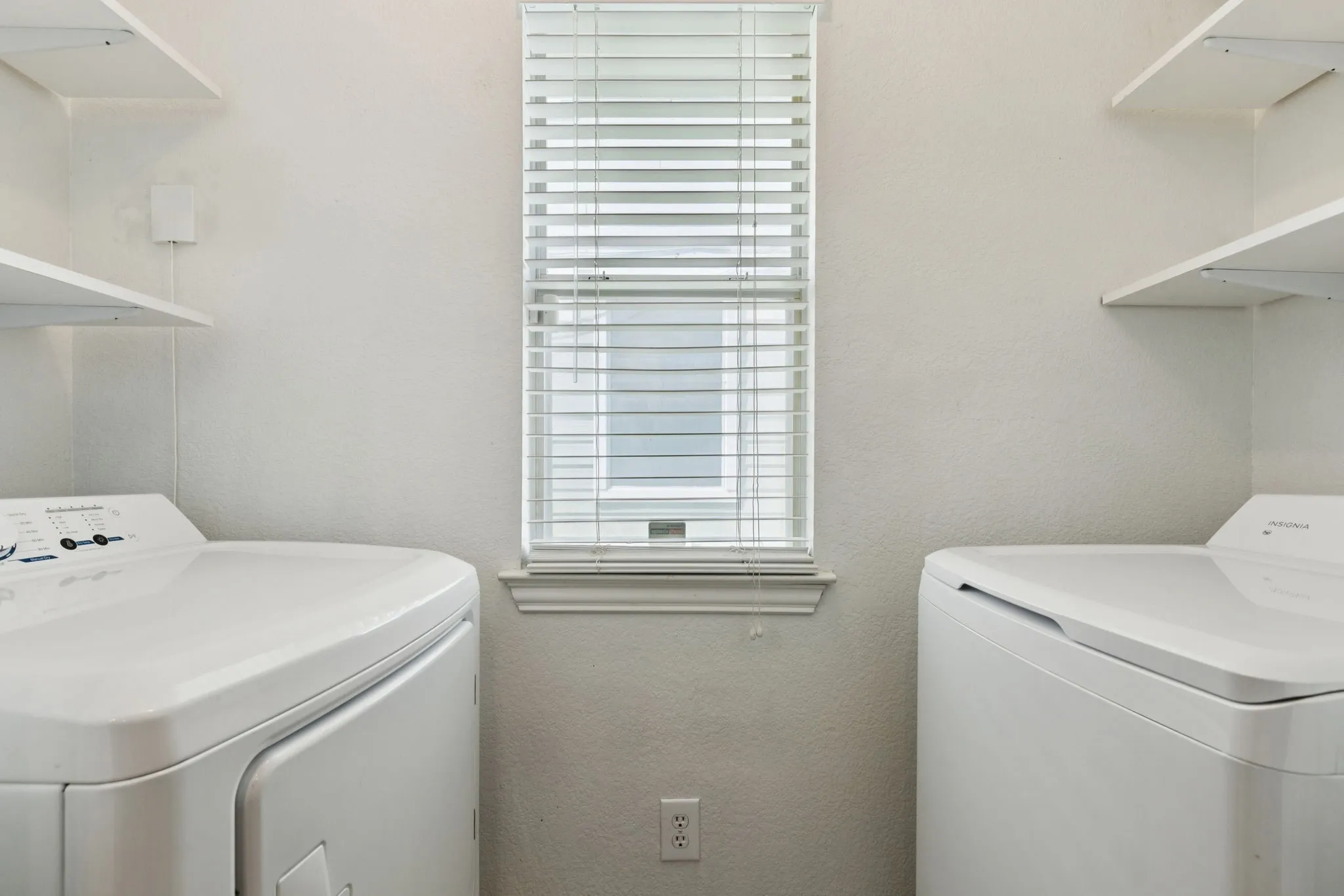 Laundry room featuring washer and dryer