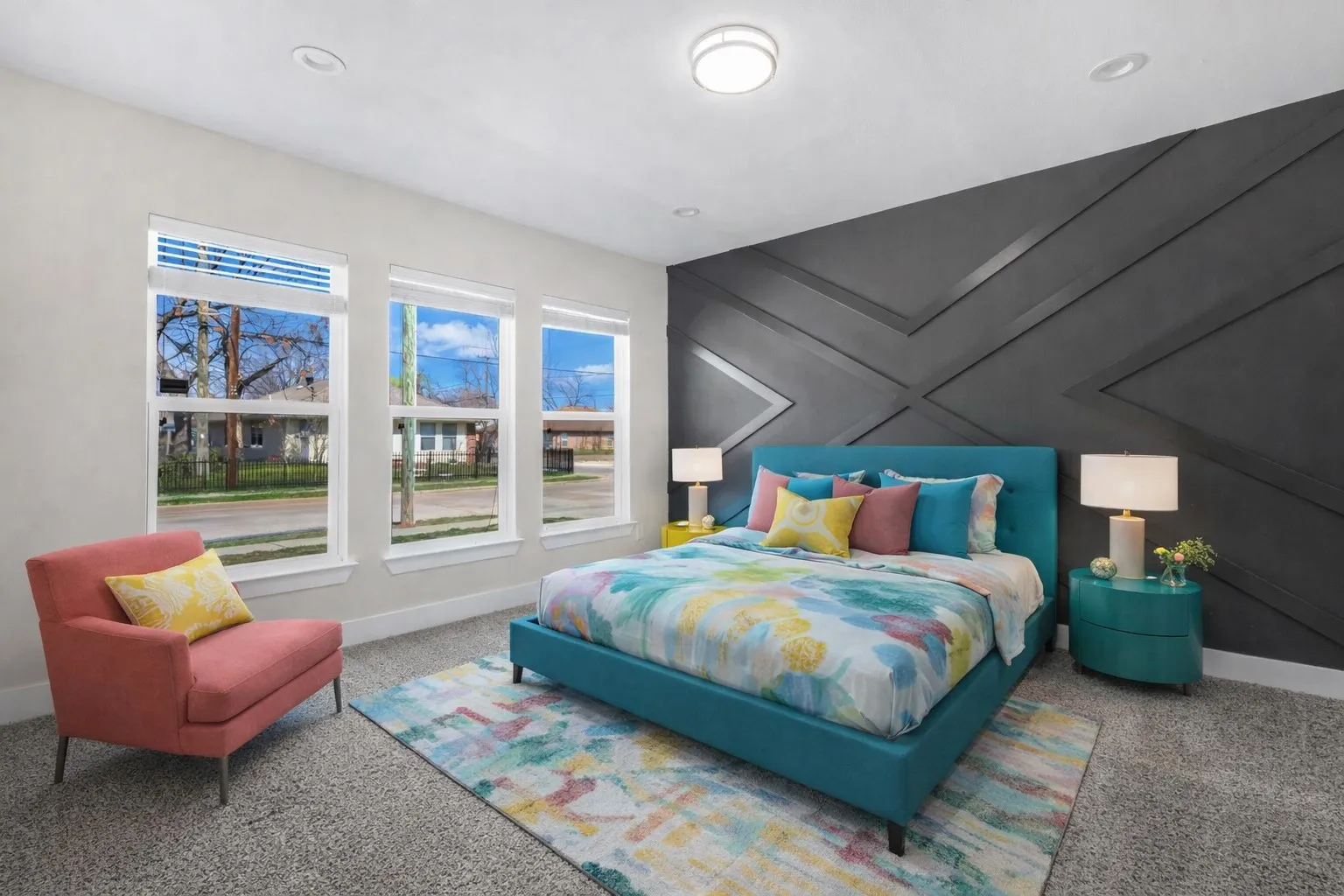 Smaller Master with Beautiful Accent wall and tons of natural light
