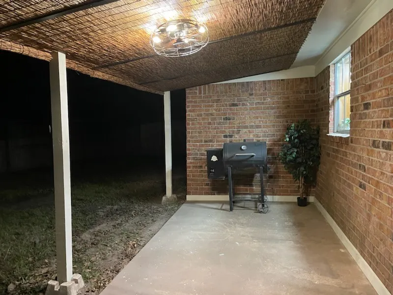 View of patio / terrace featuring area for grilling. Beautiful bambo ceiling.