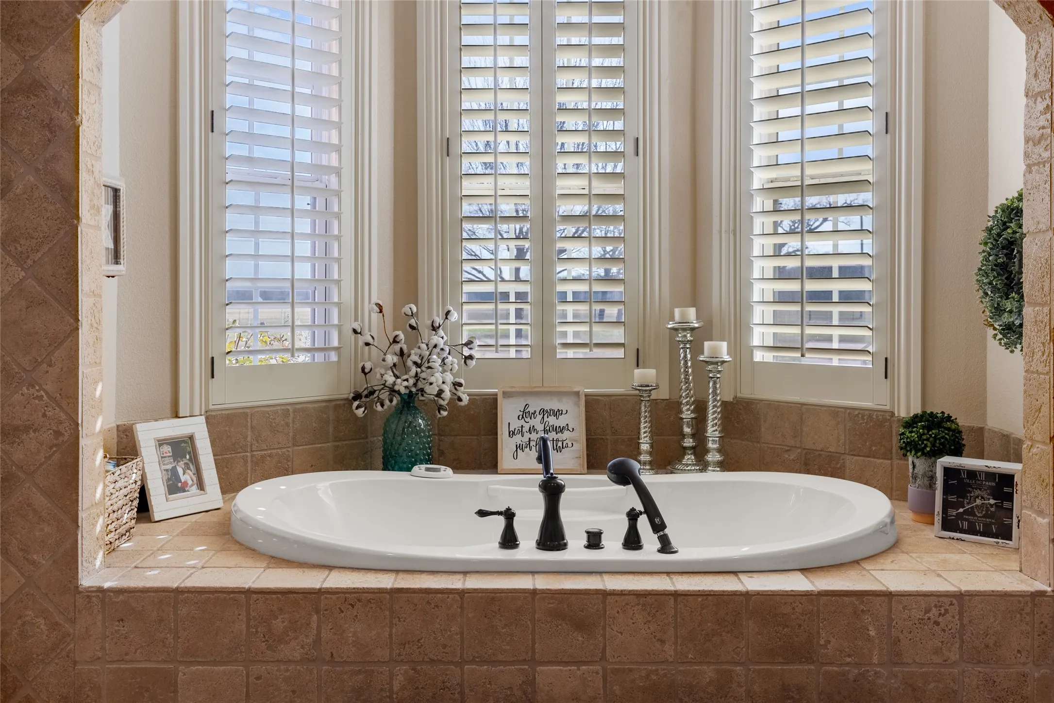 Full bath featuring a bath