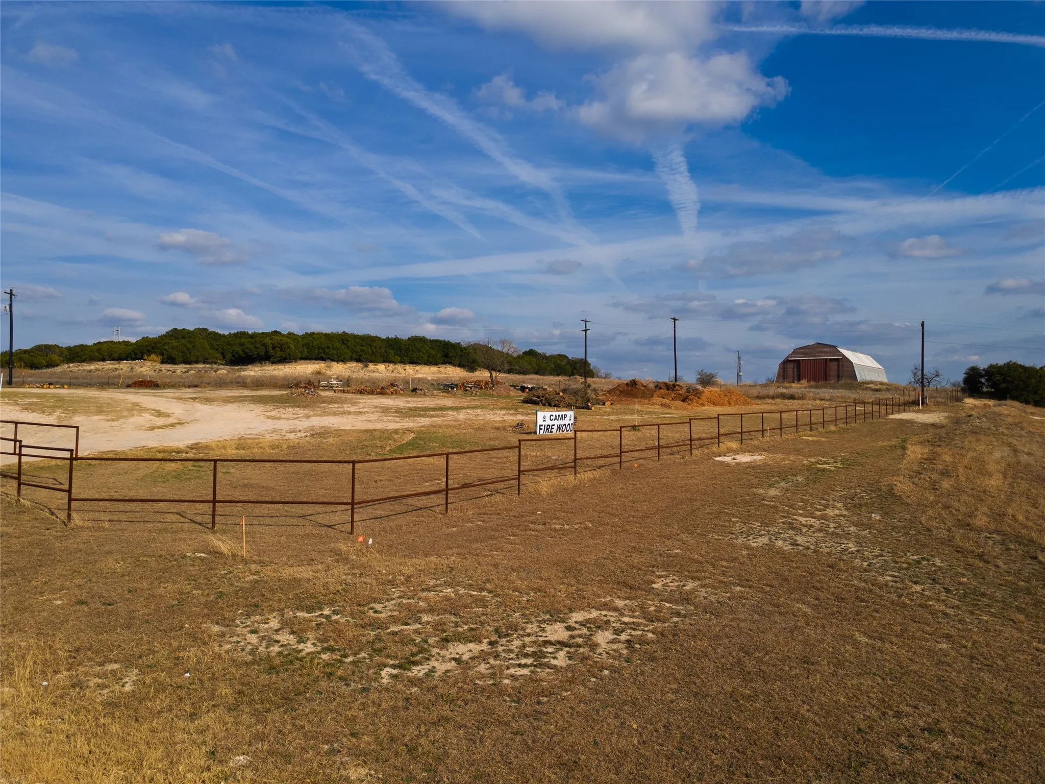 View of yard with a rural view